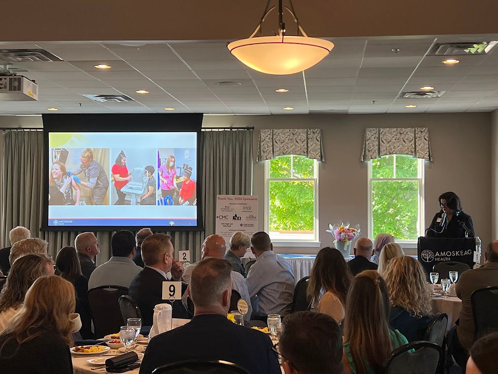 Amoskeag Health President and CEO, Kris McCracken, speaks to community members at Morning Matters event supporting children in Manchester