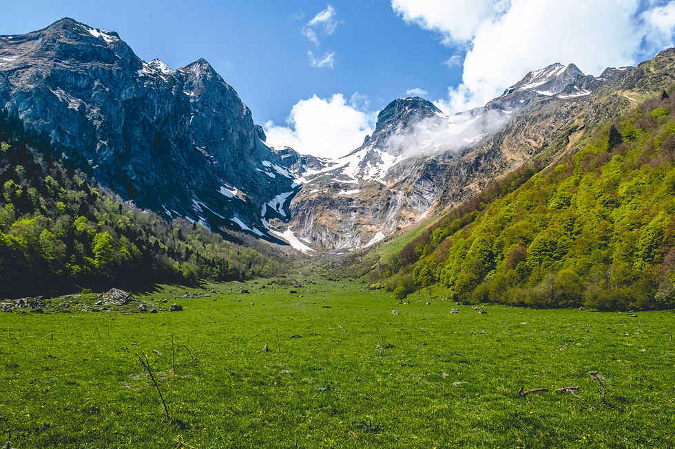 View of some mountains with some snow on top Hiking in the mountain in spring Route of the