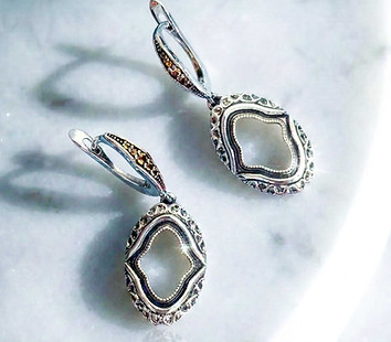 Sterling silver drop earrings with orange sapphires