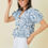 Thumbnail: Denim Embroidered Crop Top With Front Tie Detail