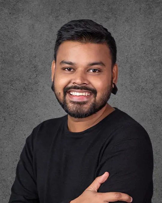 Vishal Maurya, a skilled tattoo artist in Mumbai excelling in calligraphy and realism tattoos