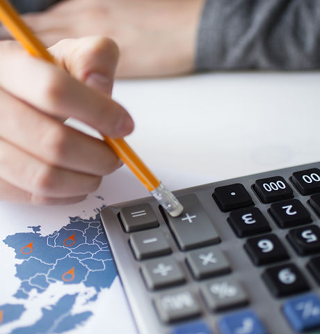 cropped-view-sales-manager-using-calculator.jpg
