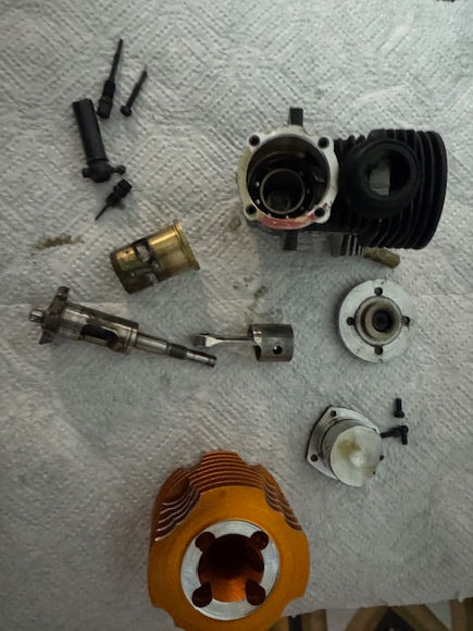 Disassembled RC engine parts for tuning