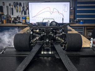 nitro RC car on a dyno for testing.