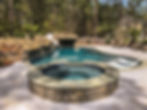 Luxurious pool with hot tub and waterslide