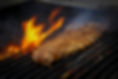 Steak on flame grill at Iron River kitchen