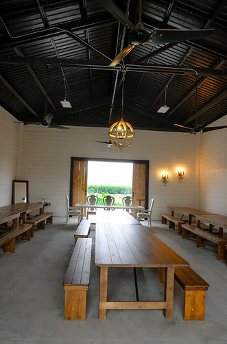The barn opens up to a beautiful farm view
