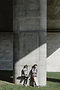 Skaters Leaning on Concrete