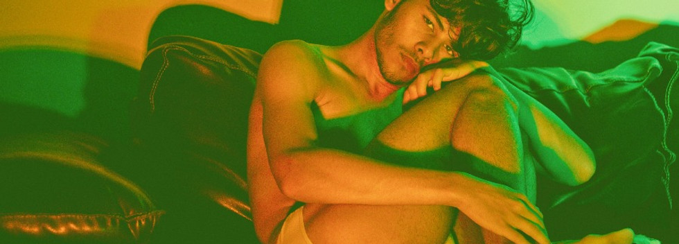 boy man in white briefs underwear on the living room sofa