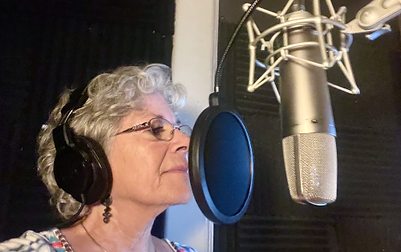 Kim Francisco in a recording studio.