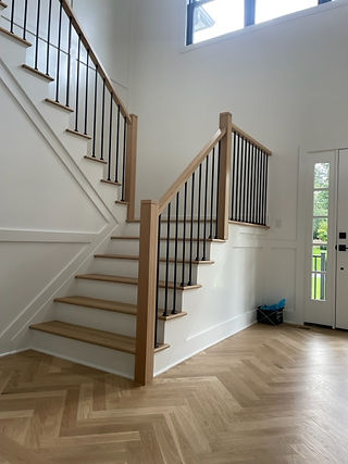a modern metal and wood railing