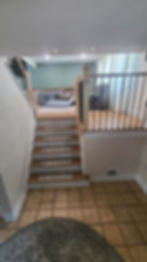 After: modern railings with metal and wood added custom gate installed in Matawan, NJ