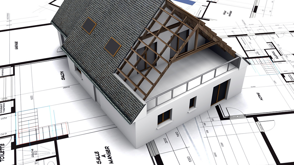 model of a home on top of architectural plans