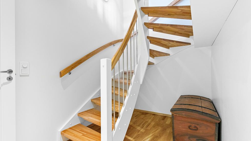 staircase winding with open treads and a metal and wood white railing