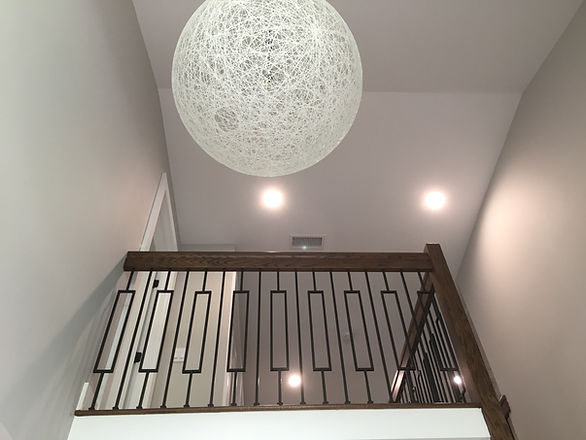 modern railings with a lamp in the center of focus photo is taken bottom view up