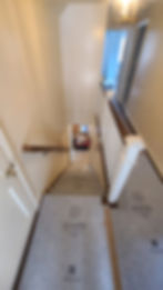 New white railing, with box newels and primed white square balusters
