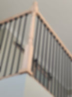before- wood balusters and metal bars, before repairs