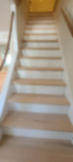 repaired staircase, new treads and risers