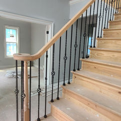 Metal twist balusters and wooden railings