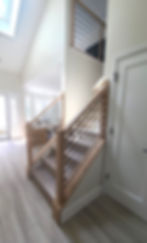 new modern horizontal railing with black metal bars, installed in Freehold, NJ