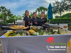 Our staff serving the wedding outside.
