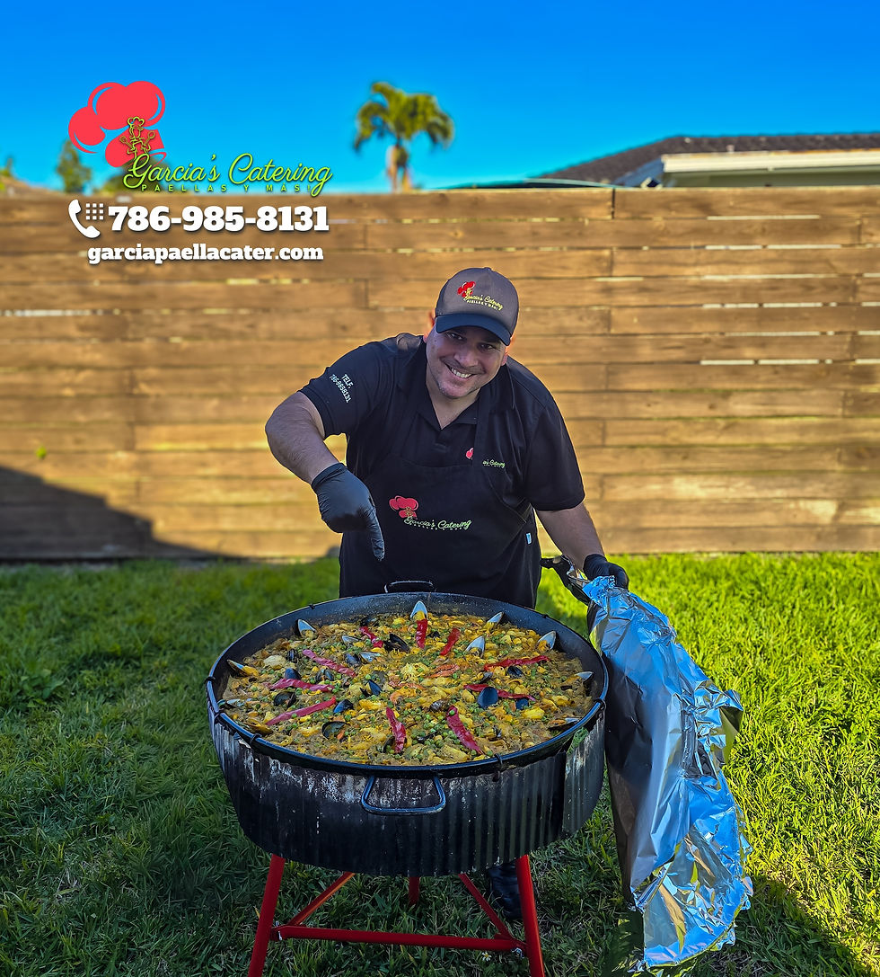 Hasley cooking for a small gathering group.