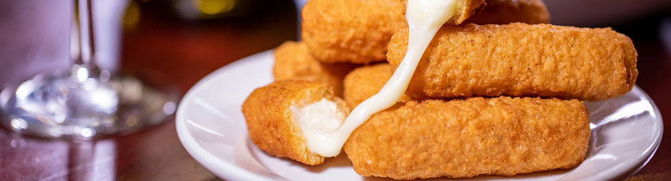 appetizer shareable starter small white saucer plate six deep-fried cheesy mozzarella stic