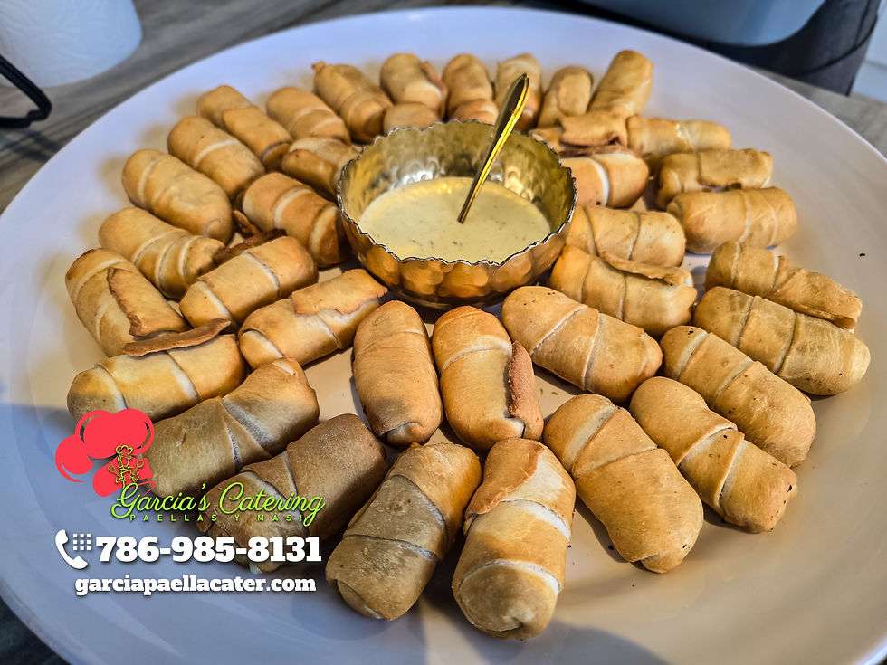 TequeƱos and garlic sauce