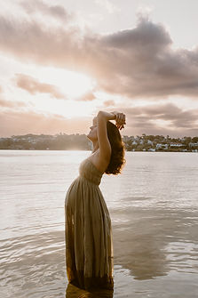 Pregnant woman sunset