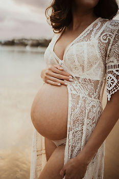 Pregnant woman sunset