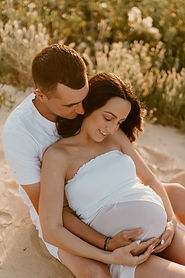 Pregnant woman sunset