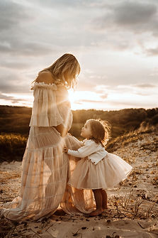 Pregnant woman sunset