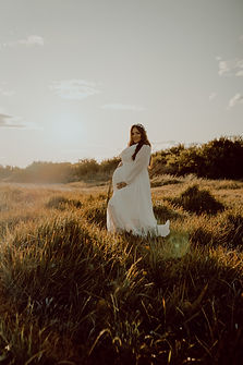 Pregnant woman sunset