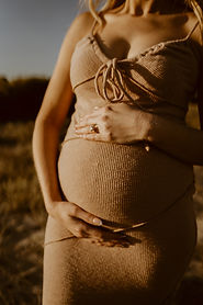 Pregnant woman sunset