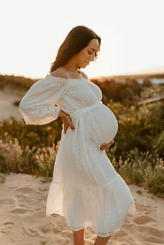 Pregnant woman sunset