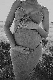 Pregnant woman sunset