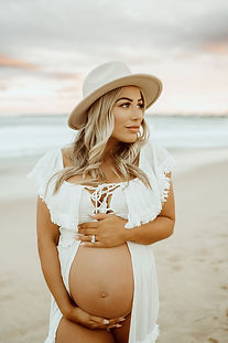 Pregnant woman sunset