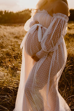 Pregnant woman sunset