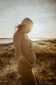 Pregnant woman sunset