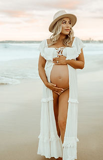 Pregnant woman sunset