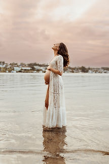 Pregnant woman sunset