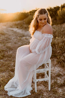Pregnant woman sunset