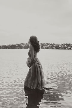 Pregnant woman sunset