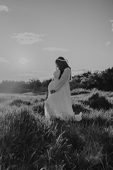 Pregnant woman sunset