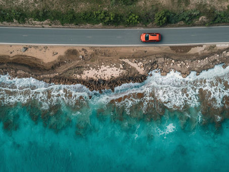 Rental Car Aerial photo on a Puerto Rico road next to the sea