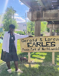 posing with sign