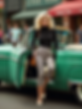 freepik__vintage-street-snapshot-a-petite-blonde-with-soft-__82973.png