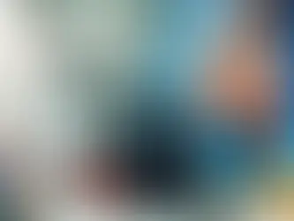 EHS engineer inspecting workplace pedestrian detection technology in a warehouse