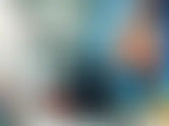 EHS engineer inspecting workplace pedestrian detection technology in a warehouse