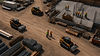 AI pedestrian detection for skid steers — aerial view of skid steer operating on active construction site with ground crew on foot nearby